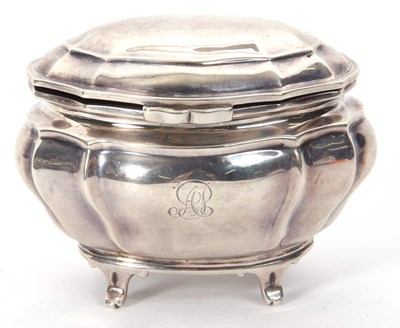 Lot 11 - An Edwardian silver oval caddy of plain...