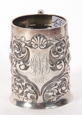 Lot 28 - A late Victorian silver mug, a slight tapering...