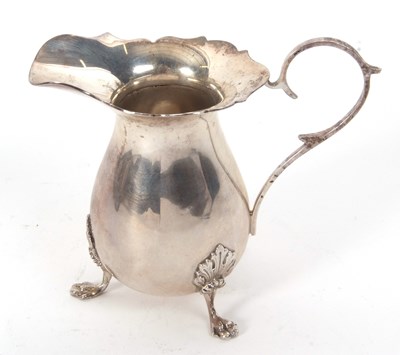 Lot 29 - An Elizabeth II silver cream jug in Georgian...