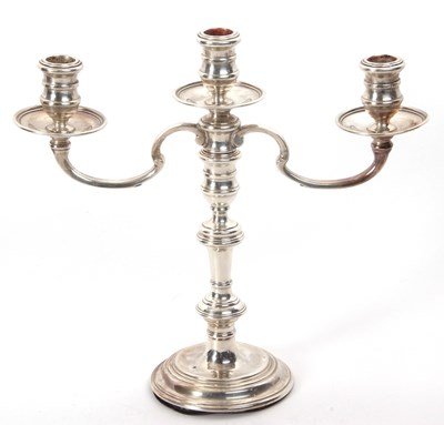 Lot 98 - A silver three light candelabra standing on a...