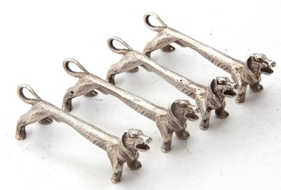 Lot 72 - Two pairs of novelty silver knife rests...