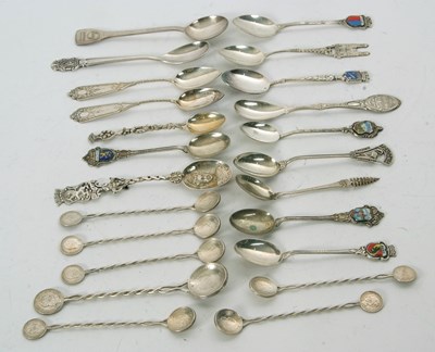 Lot 77 - A quantity of white metal souvenir teaspoons,...