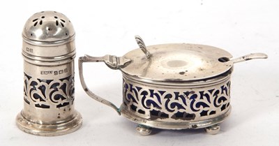 Lot 42 - A hallmarked silver mustard with blue glass...