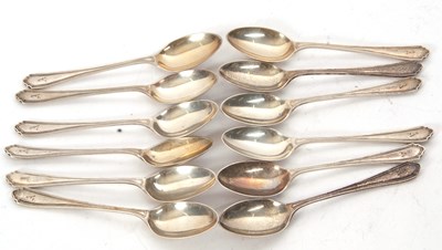 Lot 113 - Twelve George V silver teaspoons, each...