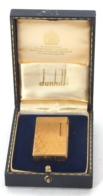 Lot 127 - A vintage gold plated Dunhill 70 lighter in...