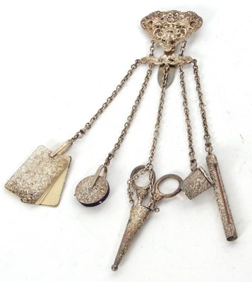 Lot 132 - An antique chatelaine having hinged pierced...