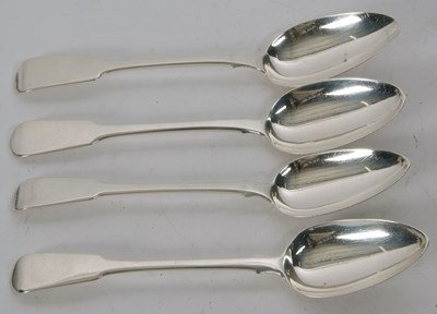 Lot 134 - A group of four fiddle pattern table spoons,...