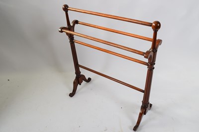 Lot 256 - Mahogany towel rail with tapering fluted end...