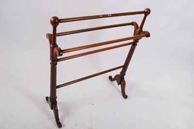 Lot 256 - Mahogany towel rail with tapering fluted end...