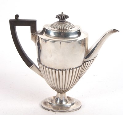 Lot 177 - An Edwardian silver coffee pot of oval form...