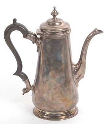 Lot 178 - A hallmarked silver coffee pot in George II...