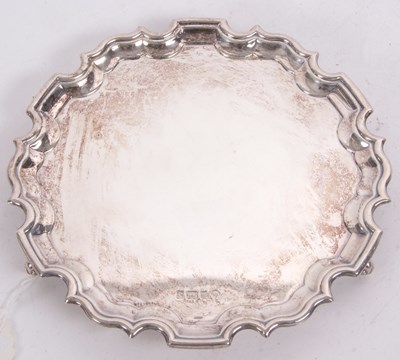 Lot 194 - An Elizabeth II silver card salver of circular...