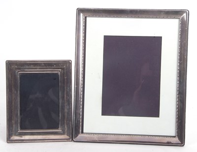 Lot 196 - A large silver plated photograph frame of...