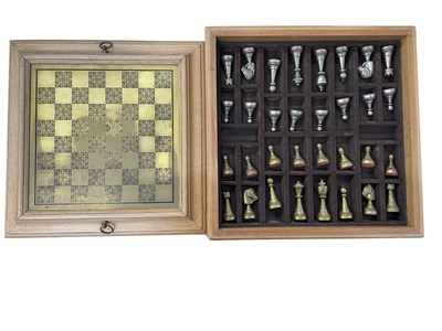 Lot 301 - An Italian Italfama chess set, metal felted...