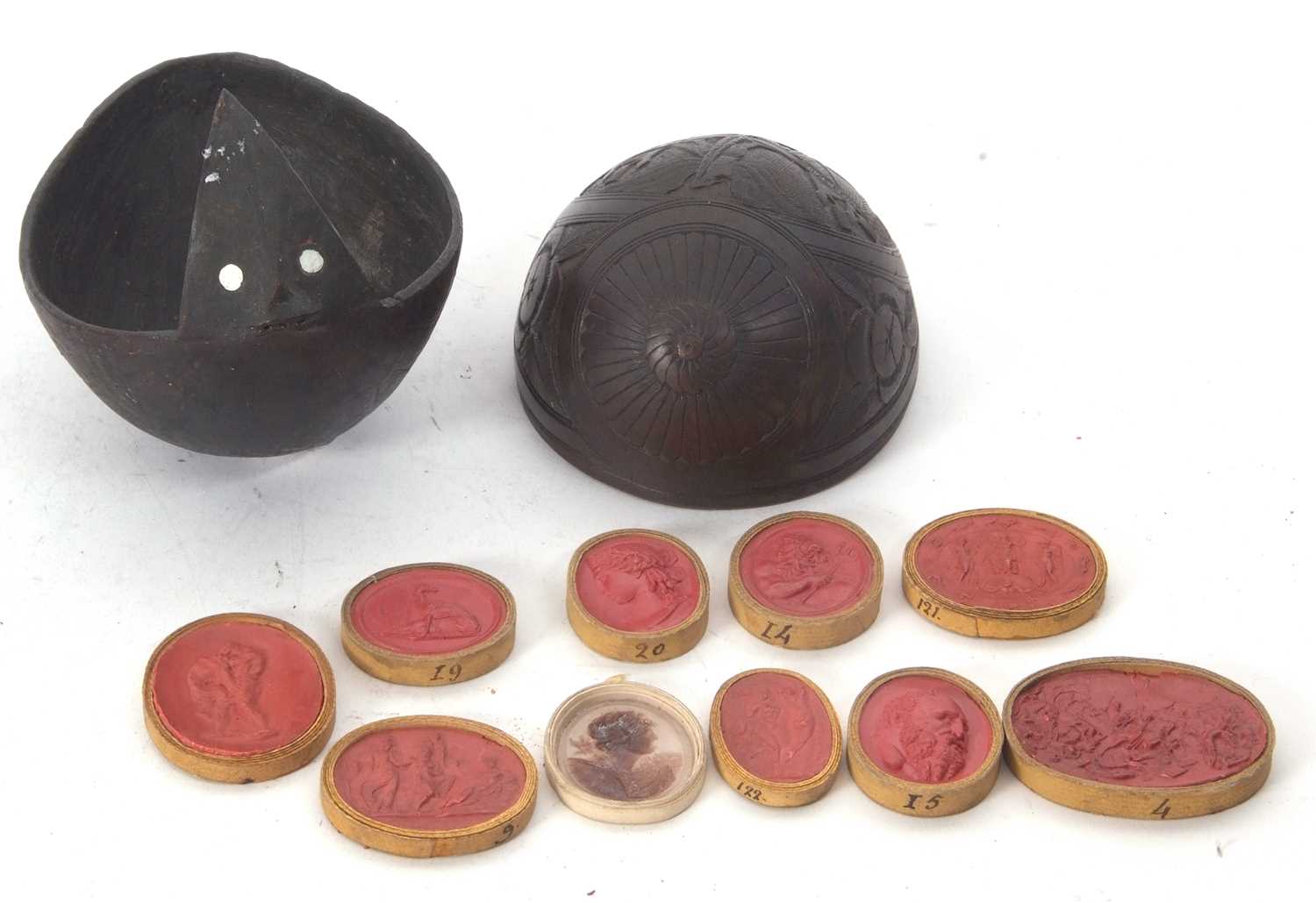 Lot 229 - Two parts of a coconut shell, one antique with...