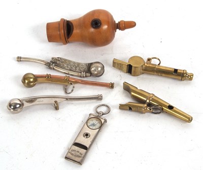 Lot 233 - A group of seven various vintage whistles, to...