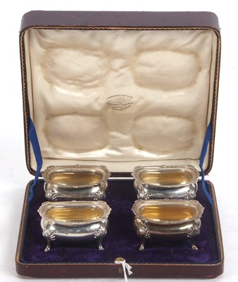 Lot 244 - A cased set of four George V salts of oval...