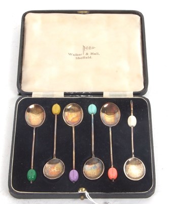 Lot 251 - Cased set of six silver gilt and enamel bean...