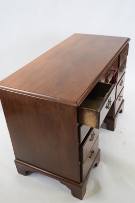 Lot 278 - George III mahogany kneehole desk, the body...