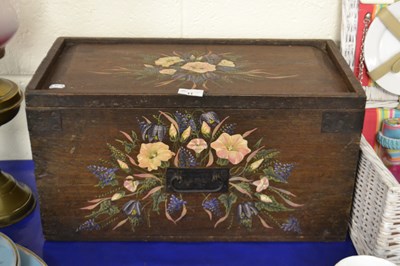 Lot 11 - A floral painted storage box with sliding lid