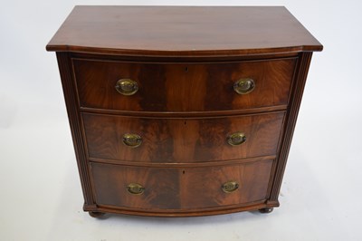 Lot 289 - Late Georgian mahogany bow front chest of...