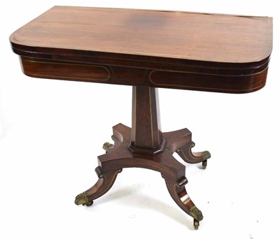 Lot 291 - Regency rosewood fold-over card table with...