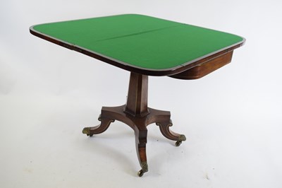 Lot 291 - Regency rosewood fold-over card table with...