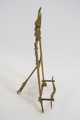 Lot 292 - Small brass table easel with foliate decoration
