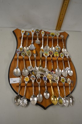 Lot 141 - A wall rack of collectors spoons