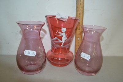 Lot 188 - A Mary Gregory style cranberry glass vase and...