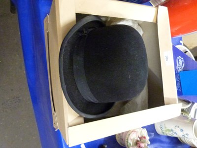 Lot 604 - A black bowler hat
