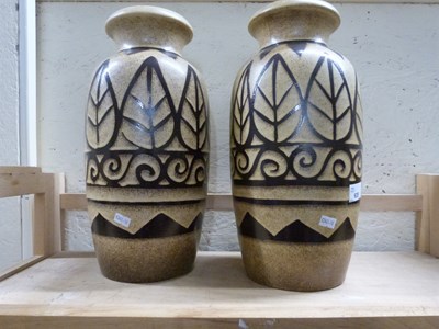 Lot 635 - A pair of German pottery vases, approx 37cm high