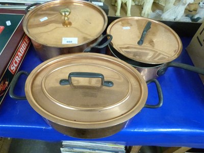 Lot 660 - Three copper pans and covers