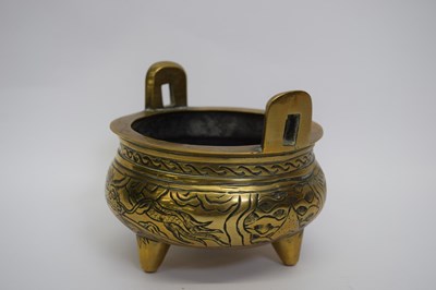 Lot 5 - Small Chinese brass censer on three stub feet,...