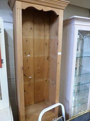 Lot 838 - Narrow pine bookcase cabinet