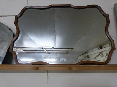 Lot 233 - Early 20th Century bevelled wall mirror in a...