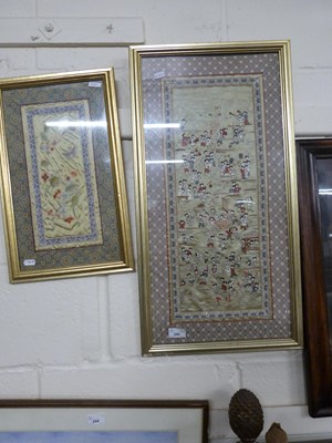 Lot 240 - Two Chinese needlework panels set in gilt...