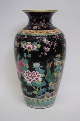 Lot 23 - Chinese porcelain famille noir vase decorated...