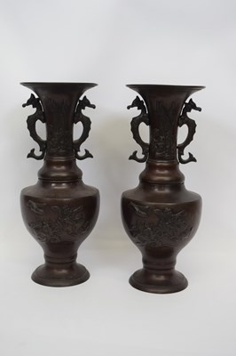 Lot 24 - Pair of Chinese bronze altar vases decorated...