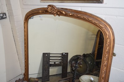 Lot 397 - 20th Century arch top over mantel mirror in a...