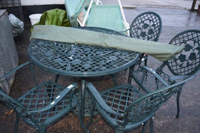 Lot 411 - Modern cast metal garden table with four...