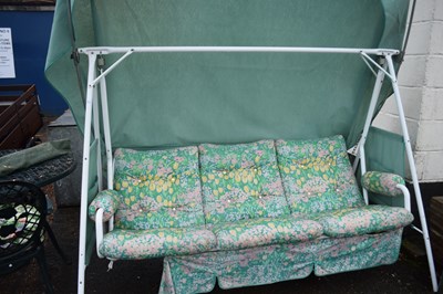 Lot 413 - Metal framed three seater swinging garden sofa