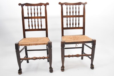 Lot 312 - Pair of North Country spindle back and rush...