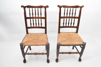 Lot 312 - Pair of North Country spindle back and rush...