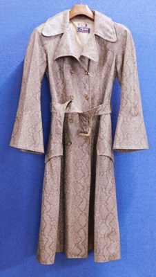 Lot 54 - A c.1960's faux snakeskin trenchcoat by...