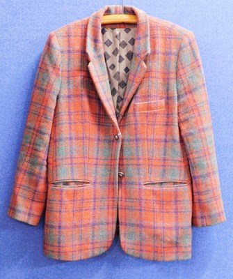 Lot 73 - A lady's Harris Tweed jacket, in orange, green...