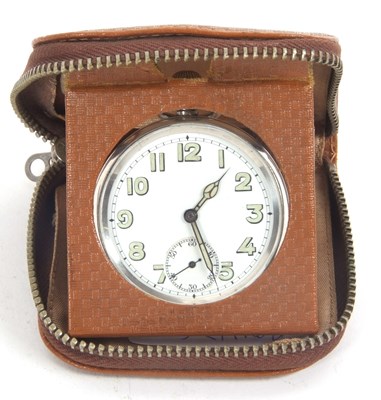 Lot 285 - A vintage travel clock to include case and...