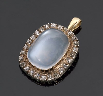 Lot 311 - A moonstone and diamond pendant, the oval...