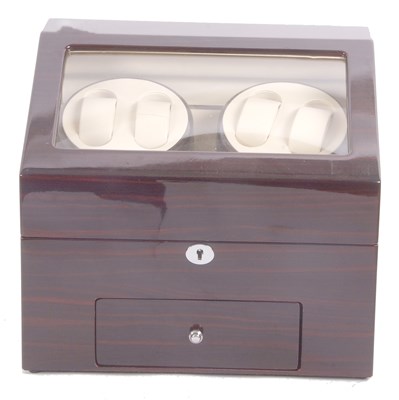 Lot 348 - An electric watch winder box, the box features...