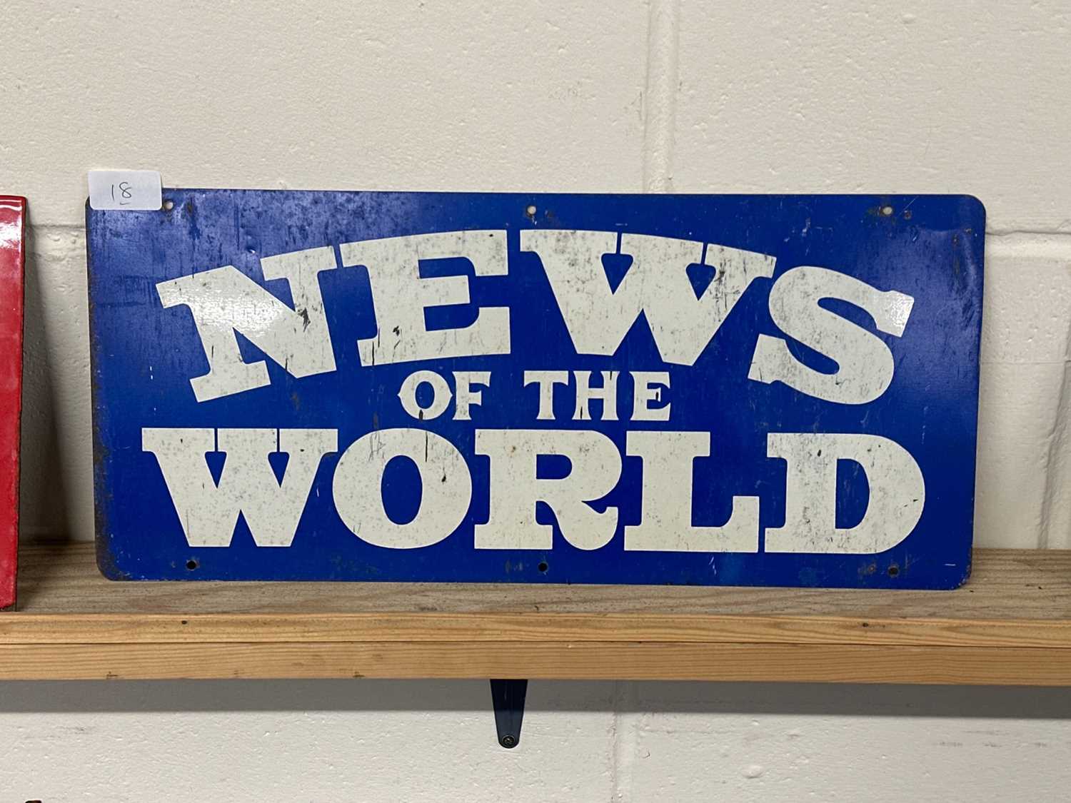Lot 18 - A coloured tin promotional sign "News of the...